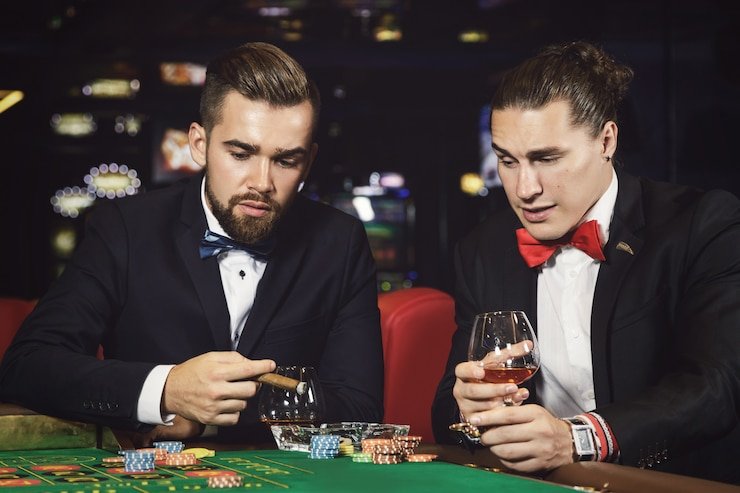 Meja permainan Hot Pot di studio bigwin138 dengan dealer profesional